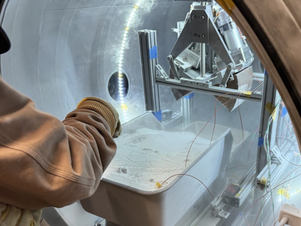 PERDEX thermal-vacuum test view for volatile-aware excavation hardware